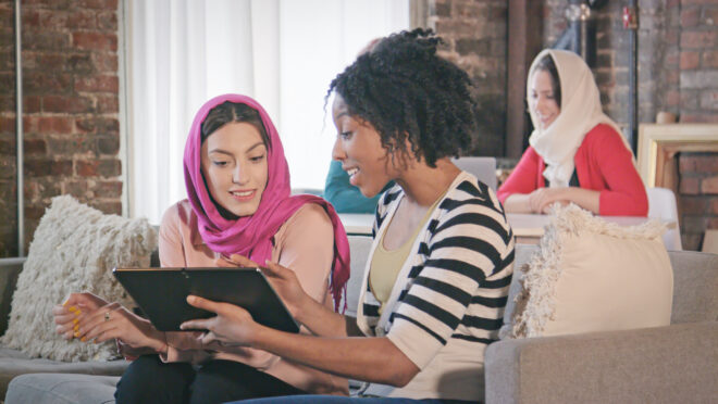 I Stock 821928326 Stock Image Multi Ethnic Female Professionals Interact W Digital Tablet